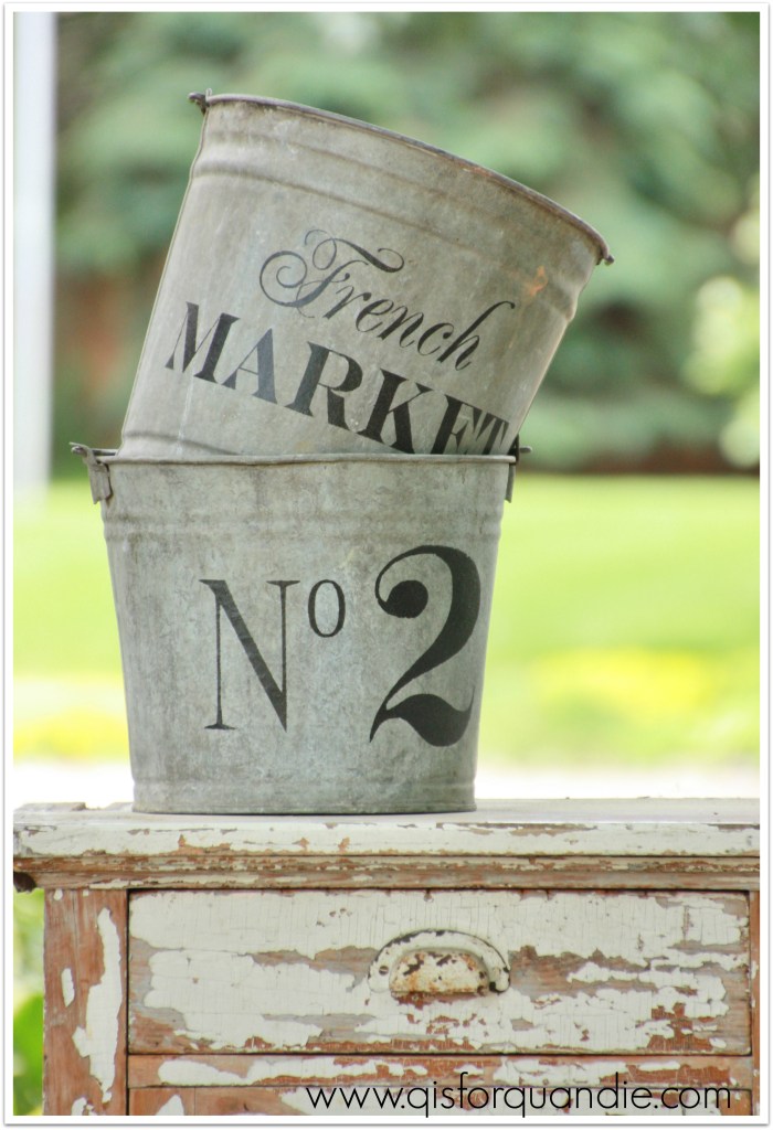 stenciled buckets closeup