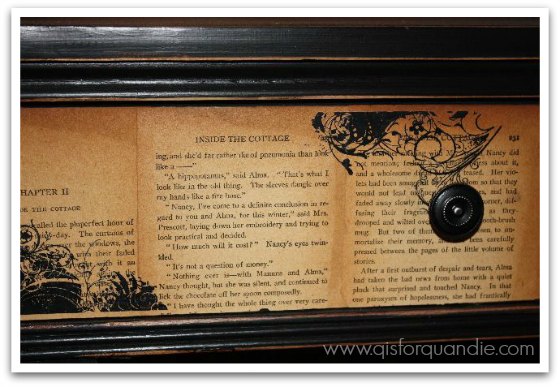 Decoupaged book pages on drawer