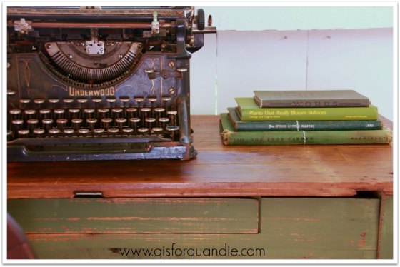 Farmhouse table with vintage typewriter and books